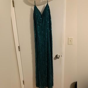 Evening gown, size 13. Worn once. Beautiful green color and very flattering.